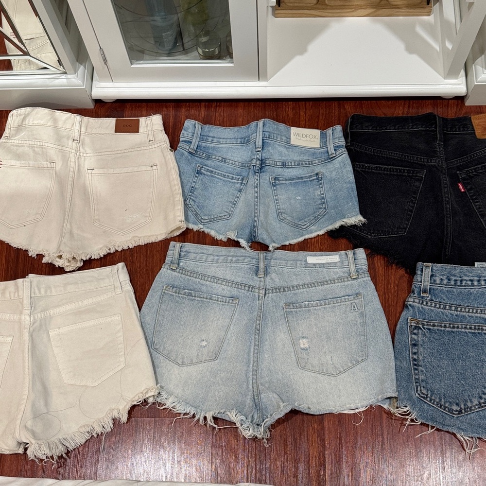 Levi's Women's Jean Shorts in Black, Blue, and Cream